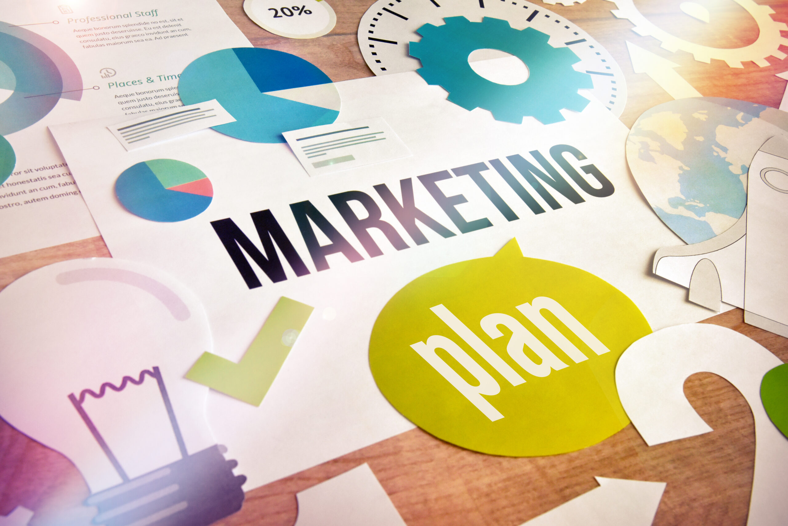 Image of a paper cutout showing the text "marketing plan"